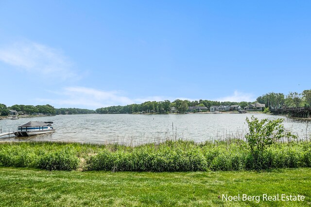 606 Edgewater Ct, Spring Lake, MI 49456 - water view featuring a boat dock