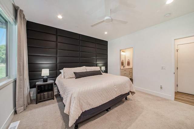 bedroom featuring light carpet, recessed lighting, visible vents, and baseboards