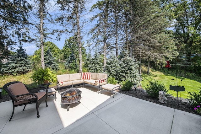 view of patio / terrace featuring an outdoor living space with a fire pit