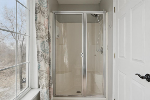 bathroom with a stall shower