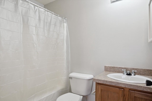 full bathroom with toilet, a shower with shower curtain, and vanity