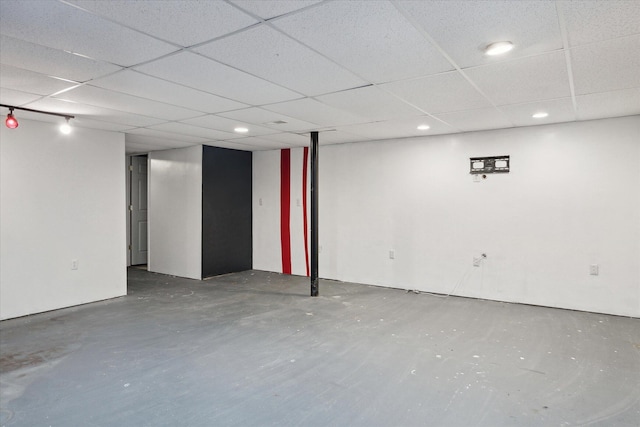 finished basement with a drop ceiling and recessed lighting