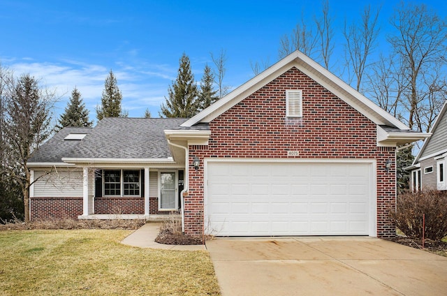 view of front of property featuring a garage, brick siding, driveway, roof with shingles, and a front yard