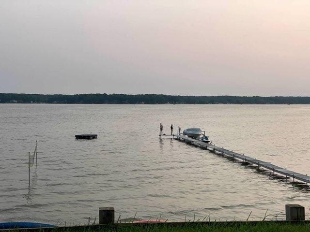 view of dock with a water view