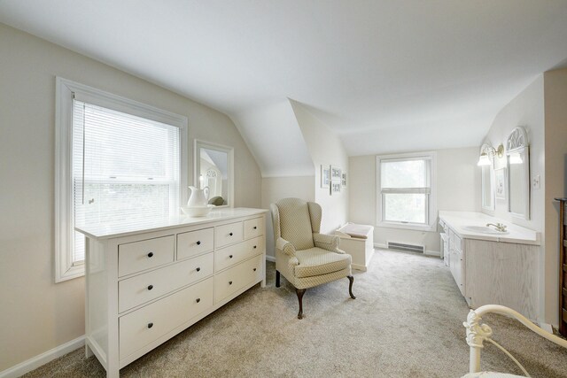 living area with lofted ceiling, light colored carpet, and visible vents