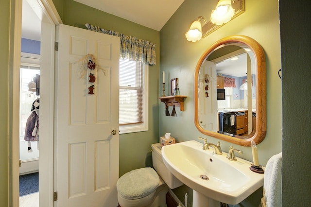 bathroom featuring a sink and toilet