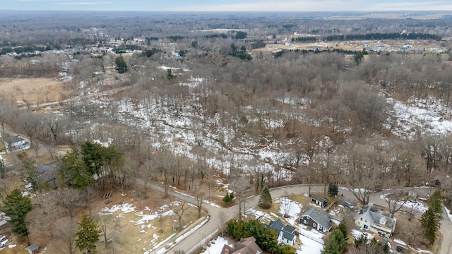 aerial view featuring a view of trees