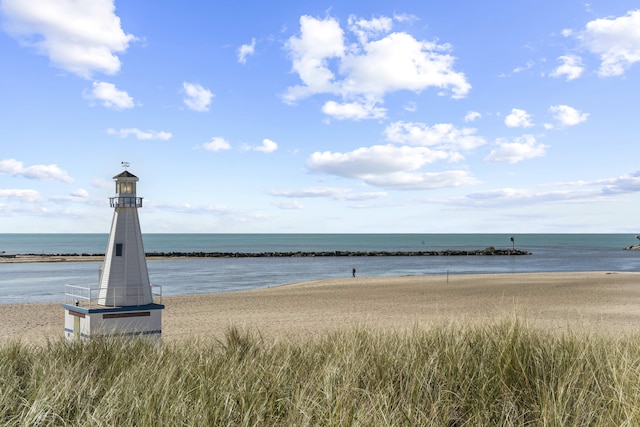 property view of water featuring a beach view