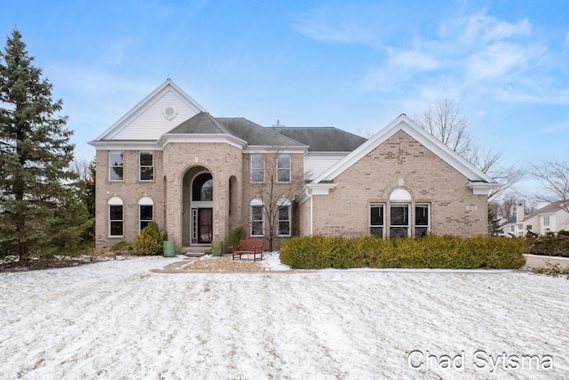 view of front of house featuring brick siding