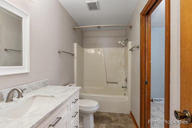 bathroom with washtub / shower combination, visible vents, vanity, and toilet