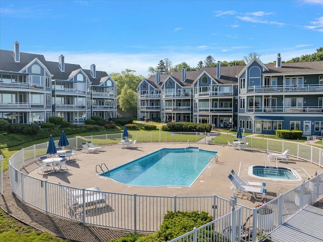 4144 Ridge Rd Unit 16, Stevensville, MI 49127 - community pool featuring a patio area
