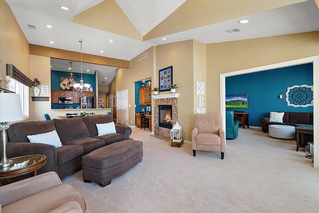 4144 Ridge Rd Unit 16, Stevensville, MI 49127 - living area featuring light colored carpet, high vaulted ceiling, a chandelier, recessed lighting, and a brick fireplace