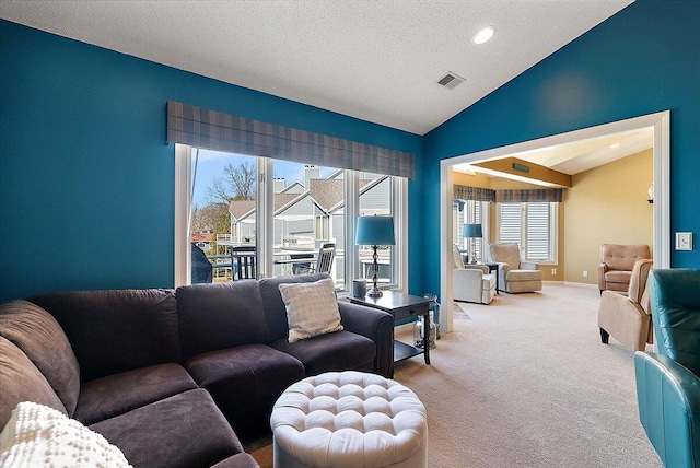 4144 Ridge Rd Unit 16, Stevensville, MI 49127 - living area featuring vaulted ceiling, carpet, recessed lighting, and a textured ceiling