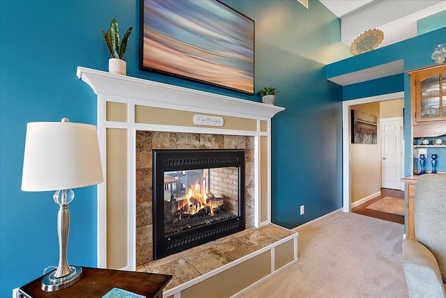 4144 Ridge Rd Unit 16, Stevensville, MI 49127 - detailed view of carpet flooring, a fireplace, and baseboards