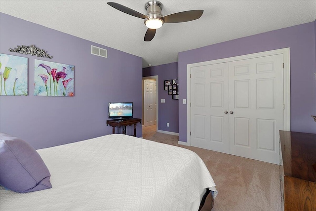 4144 Ridge Rd Unit 16, Stevensville, MI 49127 - bedroom featuring carpet, a closet, ceiling fan, and baseboards