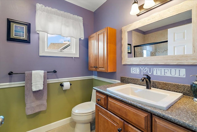 4144 Ridge Rd Unit 16, Stevensville, MI 49127 - full bath with vanity, toilet, a shower, and baseboards