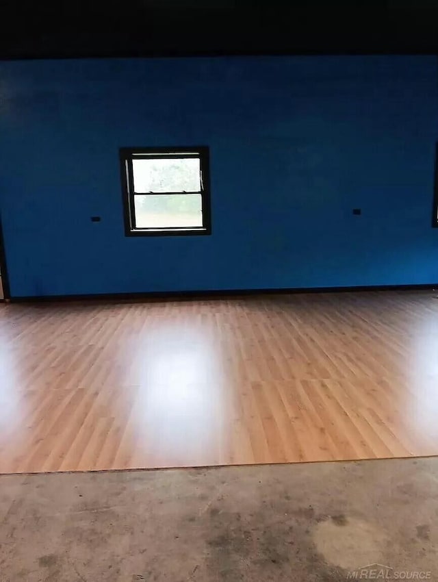 empty room featuring wood finished floors