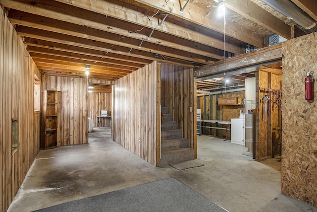 unfinished basement with stairs