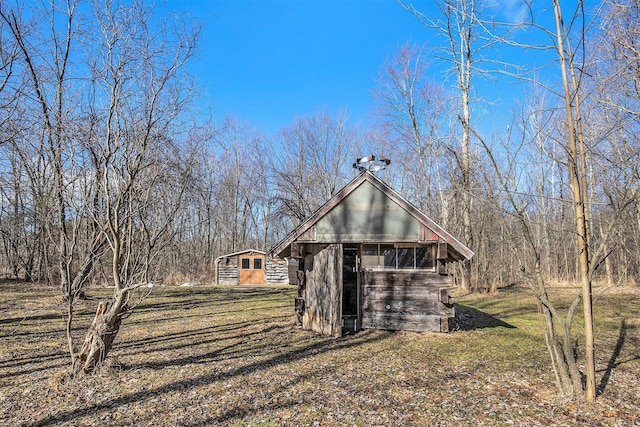 view of outbuilding featuring an outdoor structure