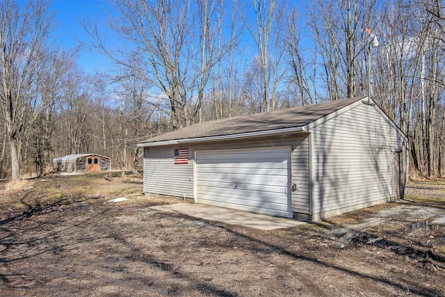 view of detached garage