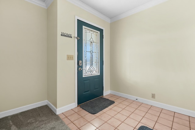 foyer entrance featuring baseboards, light tile patterned floors, and crown molding