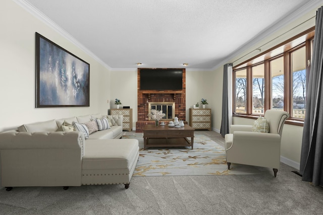 living room with a brick fireplace, baseboards, crown molding, and carpet flooring