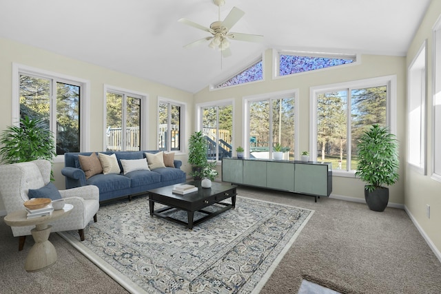 sunroom featuring lofted ceiling and ceiling fan