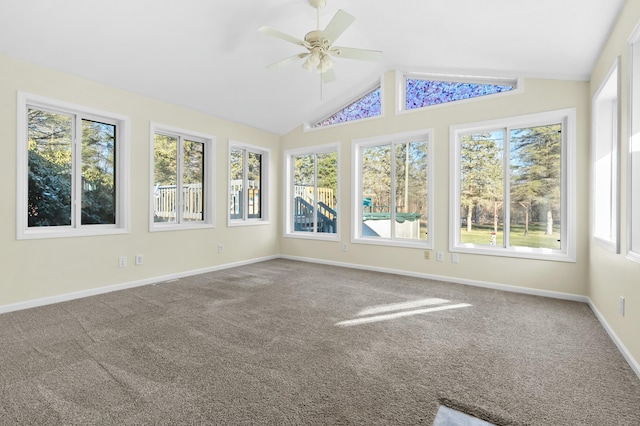 unfurnished sunroom with a wealth of natural light, ceiling fan, and lofted ceiling