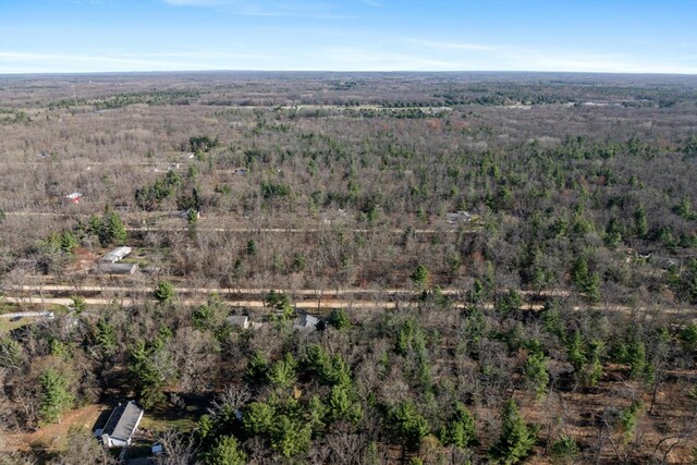 aerial view with a wooded view