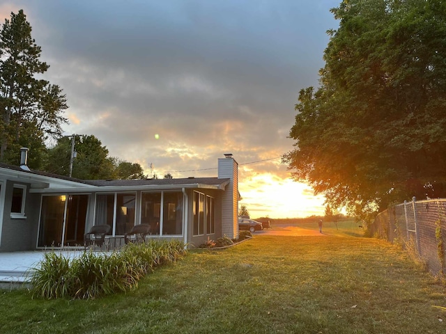 5007 S 42nd St, Climax, MI 49034 - yard at dusk featuring a sunroom