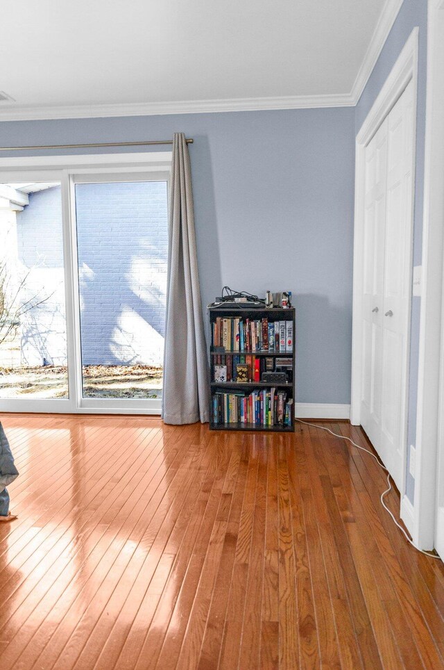 5007 S 42nd St, Climax, MI 49034 - bedroom with wood-type flooring, ornamental molding, and baseboards