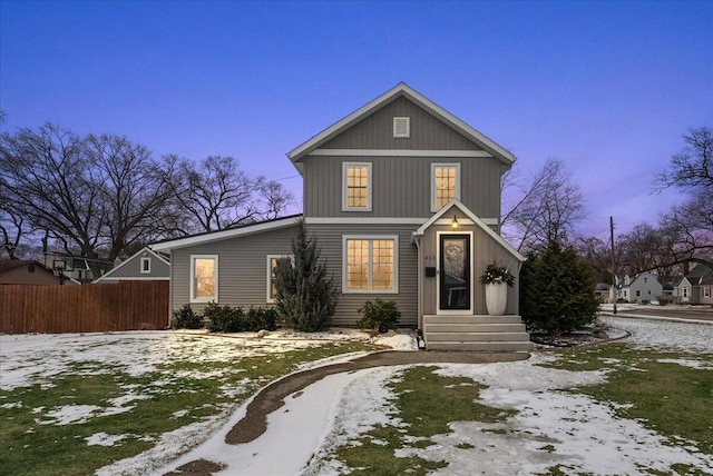 traditional home with fence