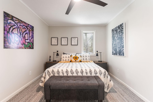 bedroom with baseboards, crown molding, and carpet