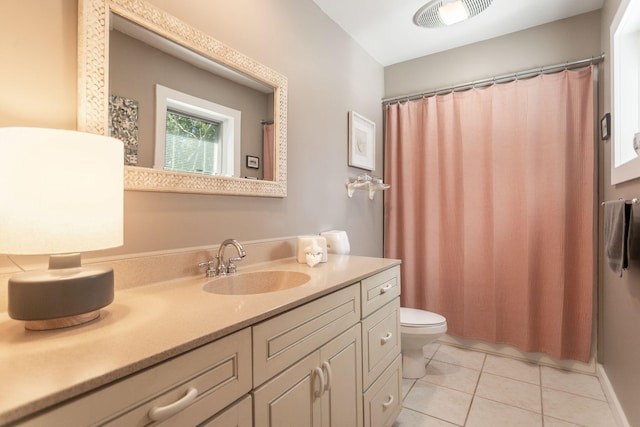 bathroom with visible vents, toilet, a shower with curtain, tile patterned floors, and vanity