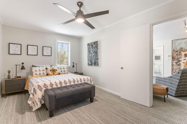 bedroom featuring baseboards, light carpet, ceiling fan, and crown molding