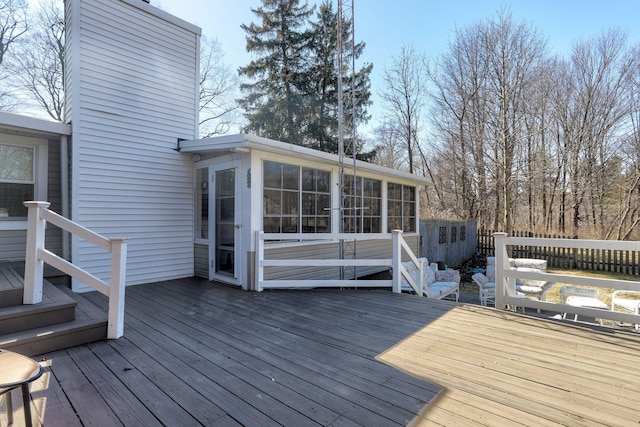 wooden terrace with a sunroom