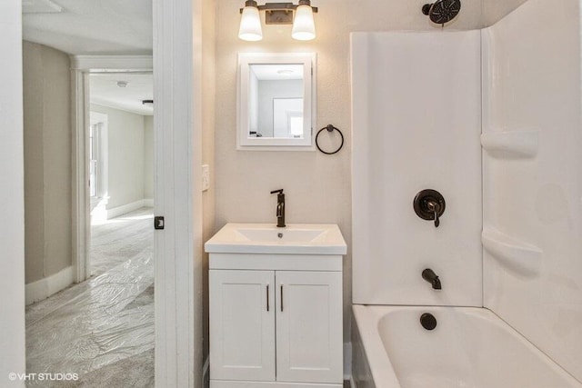 bathroom with shower / washtub combination and vanity