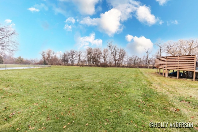 view of yard with a rural view