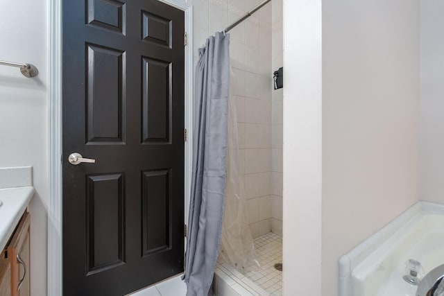 bathroom featuring a shower stall