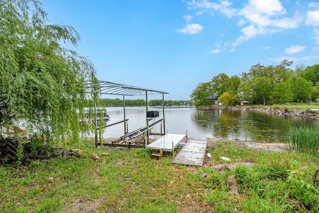 view of dock featuring a water view and boat lift