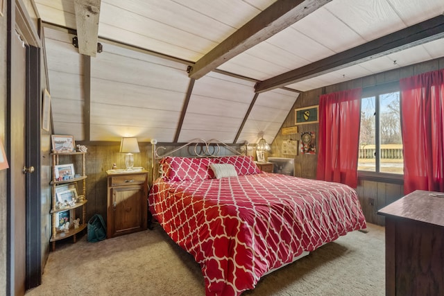 bedroom featuring lofted ceiling with beams, carpet floors, and wooden walls