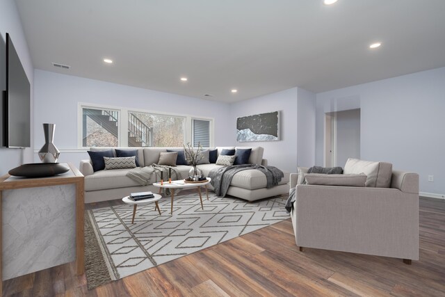 4030 Hollow Wood Dr, Portage, MI 49024 - living room featuring visible vents, wood finished floors, and recessed lighting