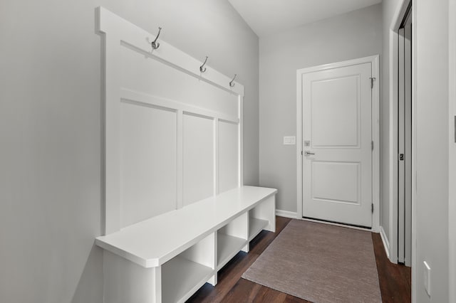 4030 Hollow Wood Dr, Portage, MI 49024 - mudroom featuring baseboards and dark wood-style flooring