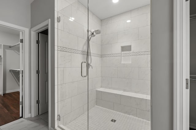 4030 Hollow Wood Dr, Portage, MI 49024 - full bathroom with a spacious closet and a shower stall