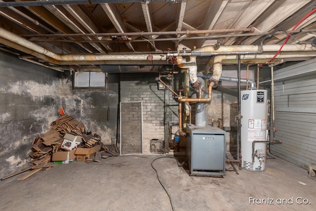 unfinished below grade area with gas water heater and a heating unit