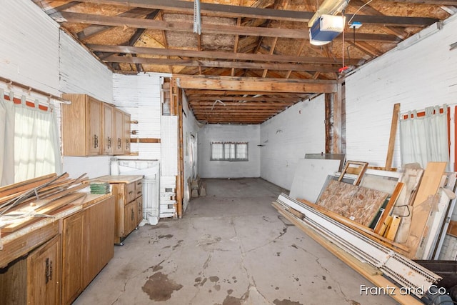 interior space featuring a wealth of natural light and unfinished concrete floors