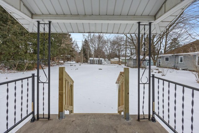 view of yard covered in snow