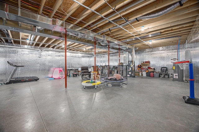 unfinished basement with electric water heater