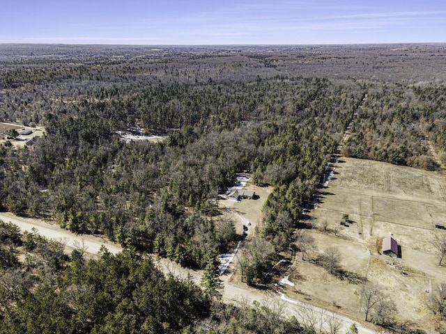 aerial view featuring a forest view