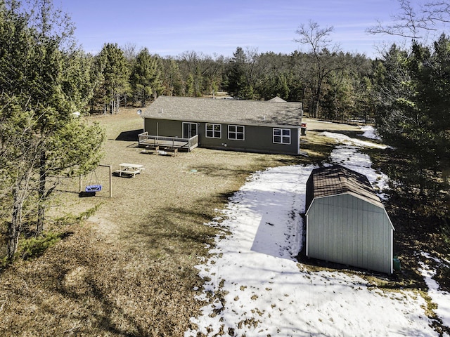 rear view of house with a forest view